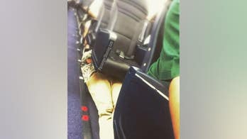 Passenger shamed for resting under plane seats: 'This is so nuts'