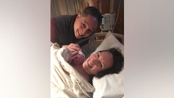 Baby born through embryo donation years after being frozen, stored