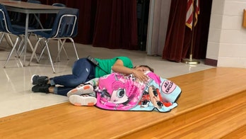 Janitor comforting student with autism goes viral for act of kindness