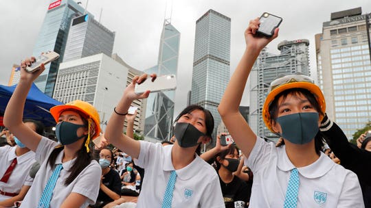 Hong Kong students skip first day of school to hold anti-government protests