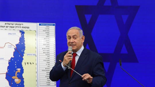 Netanyahu whisked offstage at campaign rally after rockets fired from Gaza Strip