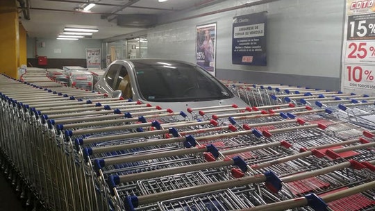 Argentina supermarket employees prank 'moron' who parked car in shopping cart section