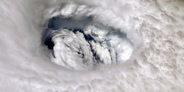 This Sept. 2, 2019 photo provided by NASA shows the eye of Hurricane Dorian shown from the International Space Station.