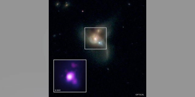 A view from multiple telescopes of SDSS J084905.51+111447.2, a system of three merging galaxies found about 1 billion light-years from Earth. The system harbors three supermassive black holes on a collision course, a new study reports. (Credit: X-ray: NASA/CXC/George Mason Univ./R. Pfeifle et al.; Optical: SDSS & NASA/STScI)