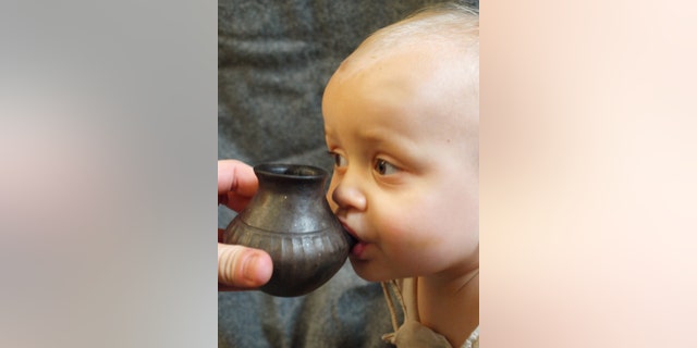 The world's first "baby bottle" used by our Bronze Age ancestors more than 3,000 years ago has been unveiled by scientists. (Credit: SWNS)