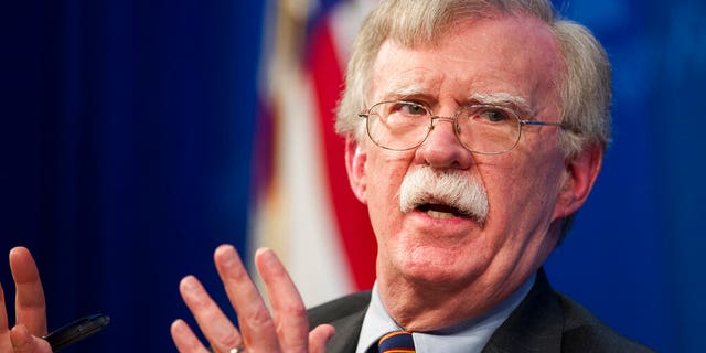 FILE - In this Dec. 13, 2018 file photo, national security adviser John Bolton unveils the Trump Administration's Africa Strategy at the Heritage Foundation in Washington. (AP Photo/Cliff Owen, File)