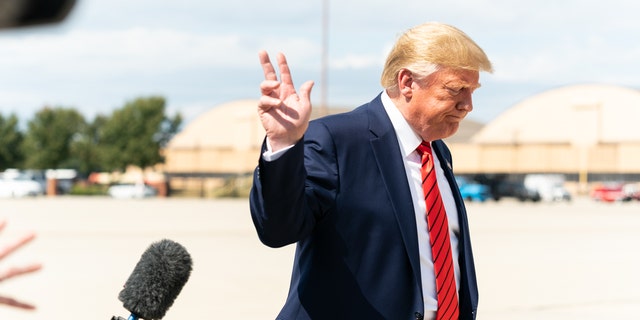 Then-President Donald Trump speaks with reporters after disembarking Air Force One Thursday, Sept. 26, 2019 at Joint Base Andrews, Md.