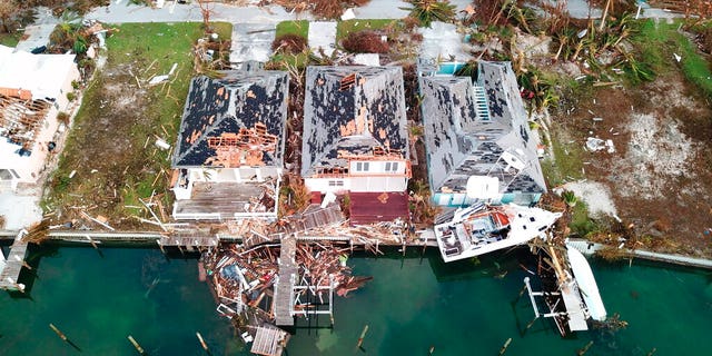 Destruction caused by Hurricane Dorian is seen from the air, in Marsh Harbor, Abaco Island, Bahamas, Friday, Sept. 6, 2019. The Bahamian health ministry said helicopters and boats are on the way to help people in affected areas, though officials warned of delays because of severe flooding and limited access. 