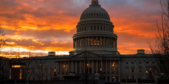 FILE - In this Jan. 24, 2019, file photo, the Capitol at sunset in Washington. Senate Majority Leader Mitch McConnell, R-Ky., appears to have the votes to end the trial against President Trump. (AP Photo/J. Scott Applewhite, File)