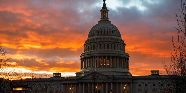 FILE - In this Jan. 24, 2019, file photo, the Capitol at sunset in Washington. Senate Majority Leader Mitch McConnell, R-Ky., appears to have the votes to end the trial against President Trump. (AP Photo/J. Scott Applewhite, File)