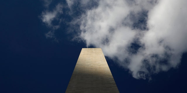 Clouds roll over the Washington Monument, as seen from the foot of the monument, during a press preview tour ahead of its official reopening, Wednesday, Sept. 18, 2019, in Washington. The monument, which has been closed to the public since August 2016, is scheduled to re-open Thursday, Sept. 19. (AP Photo/Patrick Semansky)