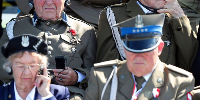 Polish war veterans attend a memorial ceremony marking the 80th anniversary of the start of World War II in Warsaw, Poland, Sunday, Sept. 1, 2019.(AP Photo/Czarek Sokolowski)