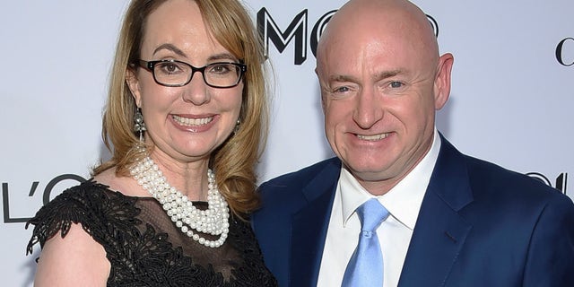 In this Nov. 12, 2018, photo politician and gun control advocate Gabrielle Giffords and husband, retired astronaut Mark Kelly, attend the Glamour Women of the Year Awards at Spring Studios in New York.