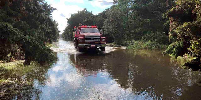 The Ocracoke Volunteer Fire Department makes rounds through the village on Friday, Sept. 6, 2019 on Ocracoke Island, N.C., in the aftermath of Hurricane Dorian.