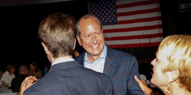 North Carolina 9th district Republican congressional candidate Dan Bishop greets supporters in Monroe, N.C., Tuesday, Sept. 10, 2019. (AP Photo/Nell Redmond)