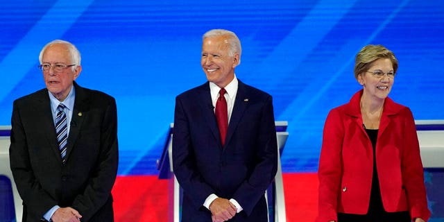 From left, presidential candidates Sen. Bernie Sanders, I-Vt., former Vice President Joe Biden and Sen. Elizabeth Warren, D-Mass., are introduced Thursday, Sept. 12, 2019, before a Democratic presidential primary debate hosted by ABC at Texas Southern University in Houston. (Associated Press)