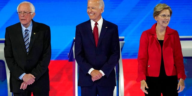 From left, presidential candidates Sen. Bernie Sanders, I-Vt., former Vice President Joe Biden and Sen. Elizabeth Warren, D-Mass., are introduced Thursday, Sept. 12, 2019, before a Democratic presidential primary debate hosted by ABC at Texas Southern University in Houston. (Associated Press)