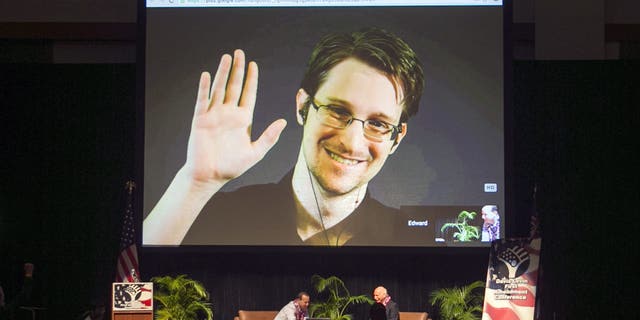 Edward Snowden appears on a live video stream broadcast from Moscow at an event sponsored by ACLU Hawaii in Honolulu on February 14, 2015. (AP Photo / Marco Garcia, File)