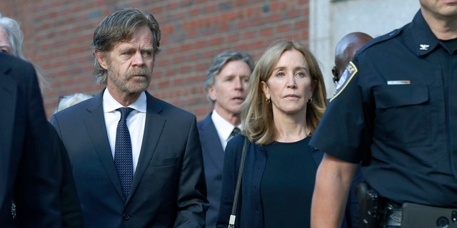 Felicity Huffman leaves the federal court with her husband, William H. Macy, left, and his brother, Moore Huffman Jr., in the center, after being convicted of a corruption scandal at a national college, on Friday, September 13, 2019. Boston.