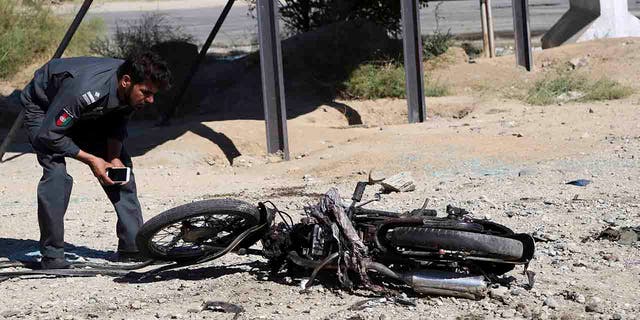 The Taliban suicide bomber on a motorcycle targeted presidential guards who were protecting President Ashraf Ghani at a campaign rally in northern Afghanistan on Tuesday, killing over 20 people and wounding over 30.