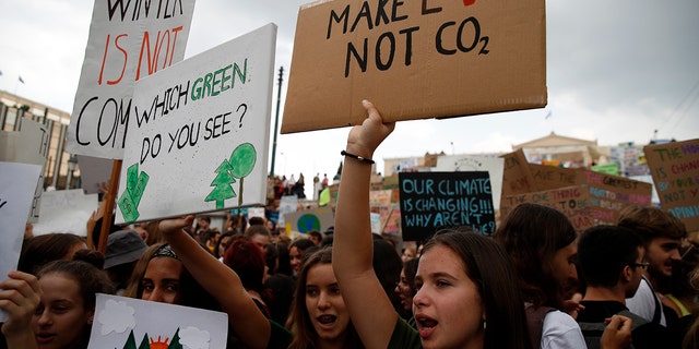 Climate protesters demonstrate in Athens, Friday, Sept. 20, 2019. Protesters around the world joined rallies on Friday as a day of worldwide demonstrations calling for action against climate change began ahead of a U.N. summit in New York. (AP Photo/Thanassis Stavrakis)