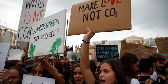 Climate protesters demonstrate in Athens, Friday, Sept. 20, 2019. Protesters around the world joined rallies on Friday as a day of worldwide demonstrations calling for action against climate change began ahead of a U.N. summit in New York. (AP Photo/Thanassis Stavrakis)