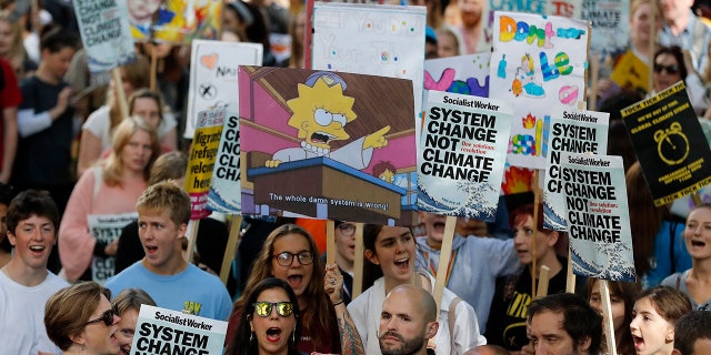 Climate protesters demonstrate in London, Friday, Sept. 20, 2019. Protesters around the world joined rallies on Friday as a day of worldwide demonstrations calling for action against climate change began ahead of a U.N. summit in New York.