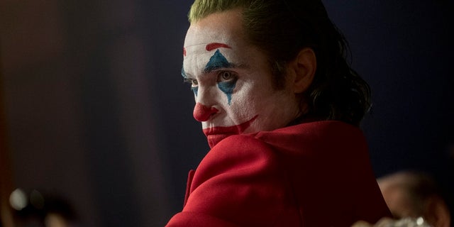 This image released by Warner Bros. Pictures shows Joaquin Phoenix in a scene from