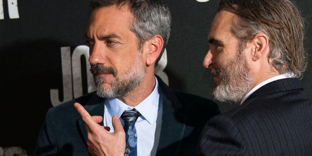 Director Todd Phillips, left and actor Joaquin Phoenix arriving at the screening for the film Joker in London.