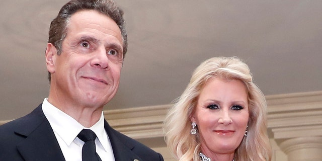 Gov. Andrew Cuomo, D-N.Y., is accompanied by his girlfriend Sandra Lee at the White House in Washington, Oct. 18, 2016. (Associated Press)