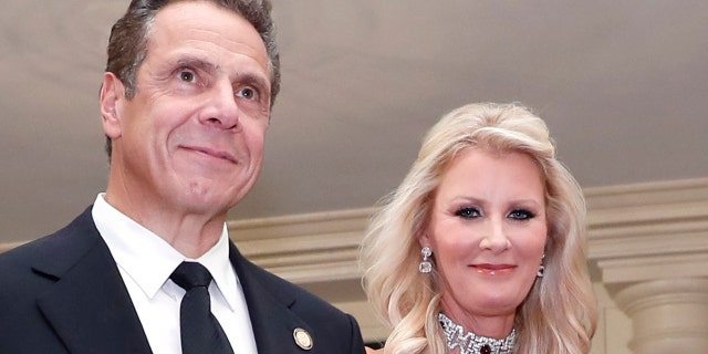 In this Oct. 18, 2016 file photo, Gov. Andrew Cuomo, D-N.Y., is accompanied by his girlfriend Sandra Lee as they arrive for a state dinner at the White House in Washington. The couple announced on Wednesday, Sept. 25, 2019 that they have broken up after more than a decade together.