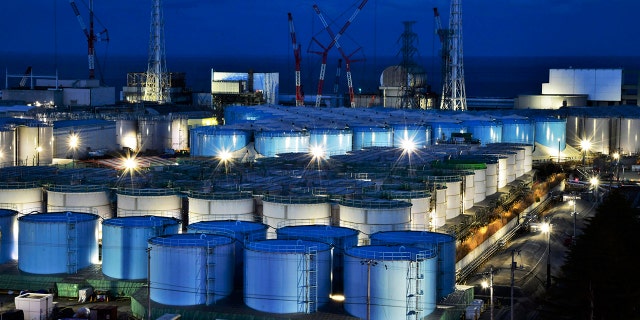 This Jan. 25, 2019, file photo shows water tanks containing contaminated water that has been treated at the Fukushima Dai-ichi nuclear plant in Okuma town, Fukushima prefecture, northeastern Japan. (Kyodo News via AP, File)