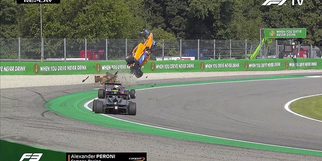 The vehicle of Alex Peroni, 19, was launched into the air after he hit a curb during a race in Monza, Italy. He suffered a fractured vertebra.