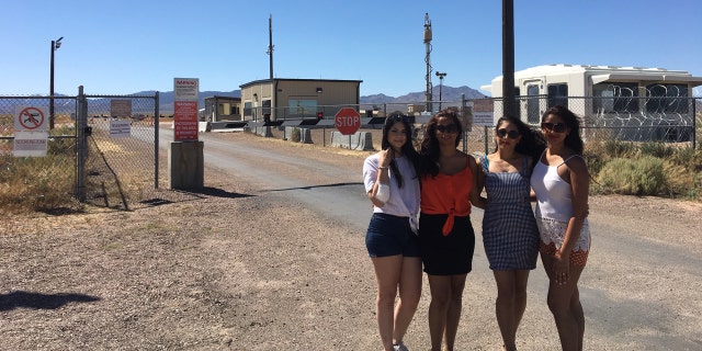 Anjali Gore, Jasmeena Samrai, Sharon Jassi, Aleisha Kaur outside the back entrance to Area 51 near Rachel, Nev.