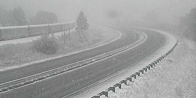 Wintry conditions were impacting Interstate 90 near Bearmouth, Mont. on Sunday.