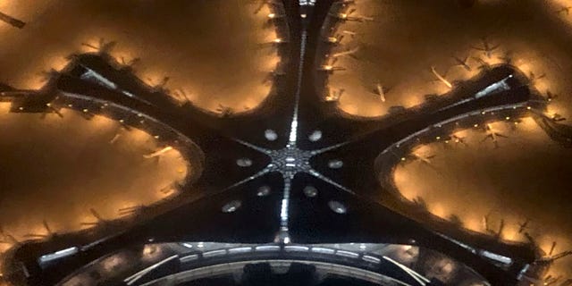 The massive airport cost an estimated $17 billion and was built in less than five years.