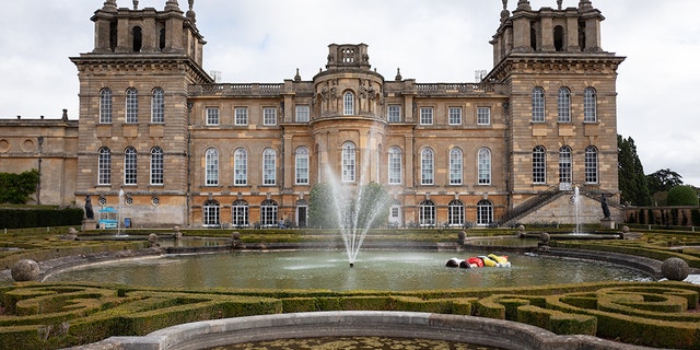 Blenheim Palace, Woodstock, England. As well as the toilet, there is currently a large scale recreation of the drowning Disney character Pinocchio, created by artist Maurizio Cattelan, in a pool.