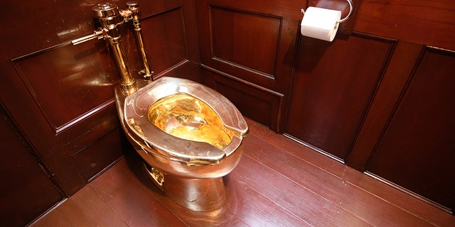 "America", a fully-working solid gold toilet, created by artist Maurizio Cattelan, is seen at Blenheim Palace before it was stolen