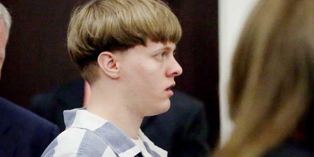Dylann Roof is escorted into the court room at the Charleston County Judicial Center to enter his guilty plea on murder charges in state court for the 2015 shooting massacre at a historic black church, in Charleston, South Carolina, April 10, 2017. REUTERS/Grace Beahm/Pool - RC184FB76560