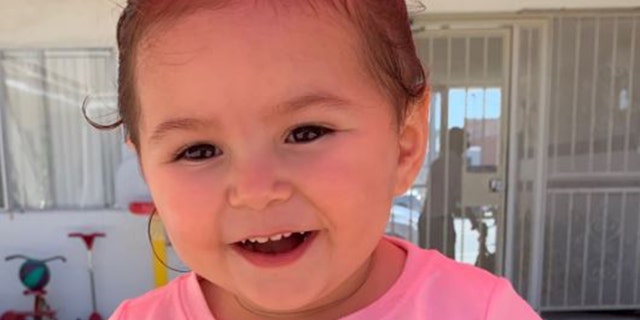 The child's mother said in a coroner's report she placed the 2-year-old in her car seat in a vehicle with the heat on, under a blanket for several hours.