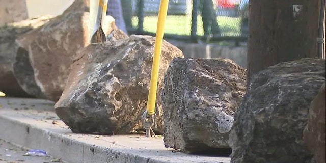 A group of neighbors in San Francisco has had two dozen boulders placed along a residential road to deter people from camping out.
