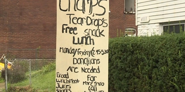 Champale Anderson has a sign outside her home promoting the free snacks from the kids in the neighborhood.