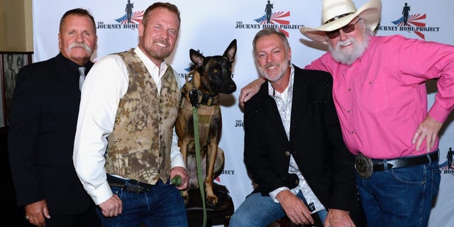 Left to right: Charlie Daniels manager and The Journey Home Project co-founder David Corlew, Mark “Oz” Geist, Rone (dog) Darryl Worley and Charlie Daniels attend the second-annual "Charlie Daniels Patriot Award Dinner" at Palm Restaurant in Nashville on Tuesday, September 10, 2019. The event raised $200,000 for veterans.