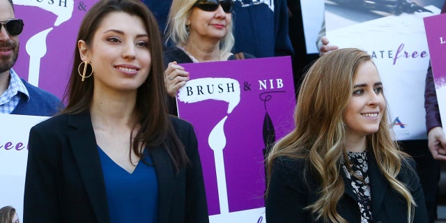 Christian artists Joanna Duka and Breanna Koski outside the Arizona Supreme Court on Jan. 22, 2019. (AP Photo/Ross D. Franklin,File)