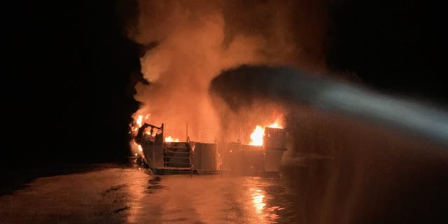 The Conception was "entirely engulfed with flames" when the U.S. Coast Guard arrived on scene Monday.