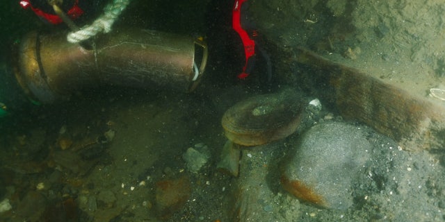 Part of the ship's rigging is exposed.