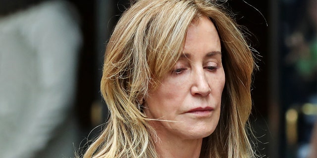 Actress Felicity Huffman was among 51 people charged in a scheme in which prosecutors say wealthy parents paid an admissions consultant to bribe coaches and test administrators to help their children get into prestigious colleges. (Photo by David L. Ryan/The Boston Globe via Getty Images)