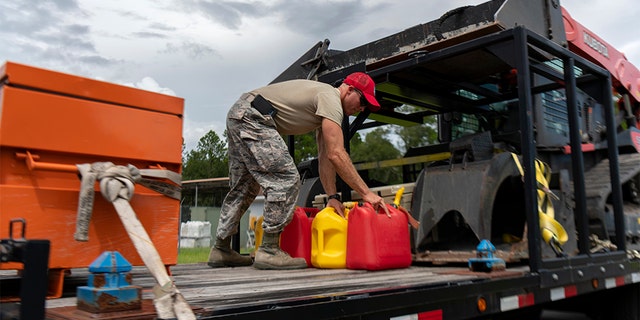 An airman from the Florida National Guard preparing equipment prior to deployment for Hurricane Dorian. (U.S. Air Force photo by Sgt. Christopher Milbrodt)