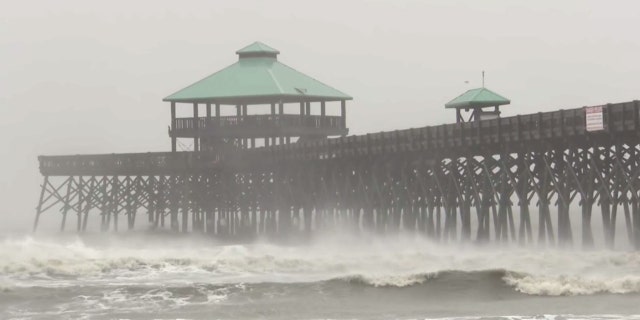 Tornadoes hit Carolinas as Hurricane Dorian floods Charleston; 200K without power 2 High surf and heavy rain were reported in Folly Beach, S.C., as Dorian neared the area.