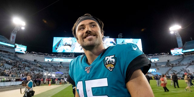 Jacksonville Jaguars quarterback Gardner Minshew (15) walks off the field after defeating the Tennessee Titans at TIAA Bank Field. (Douglas DeFelice-USA TODAY Sports)